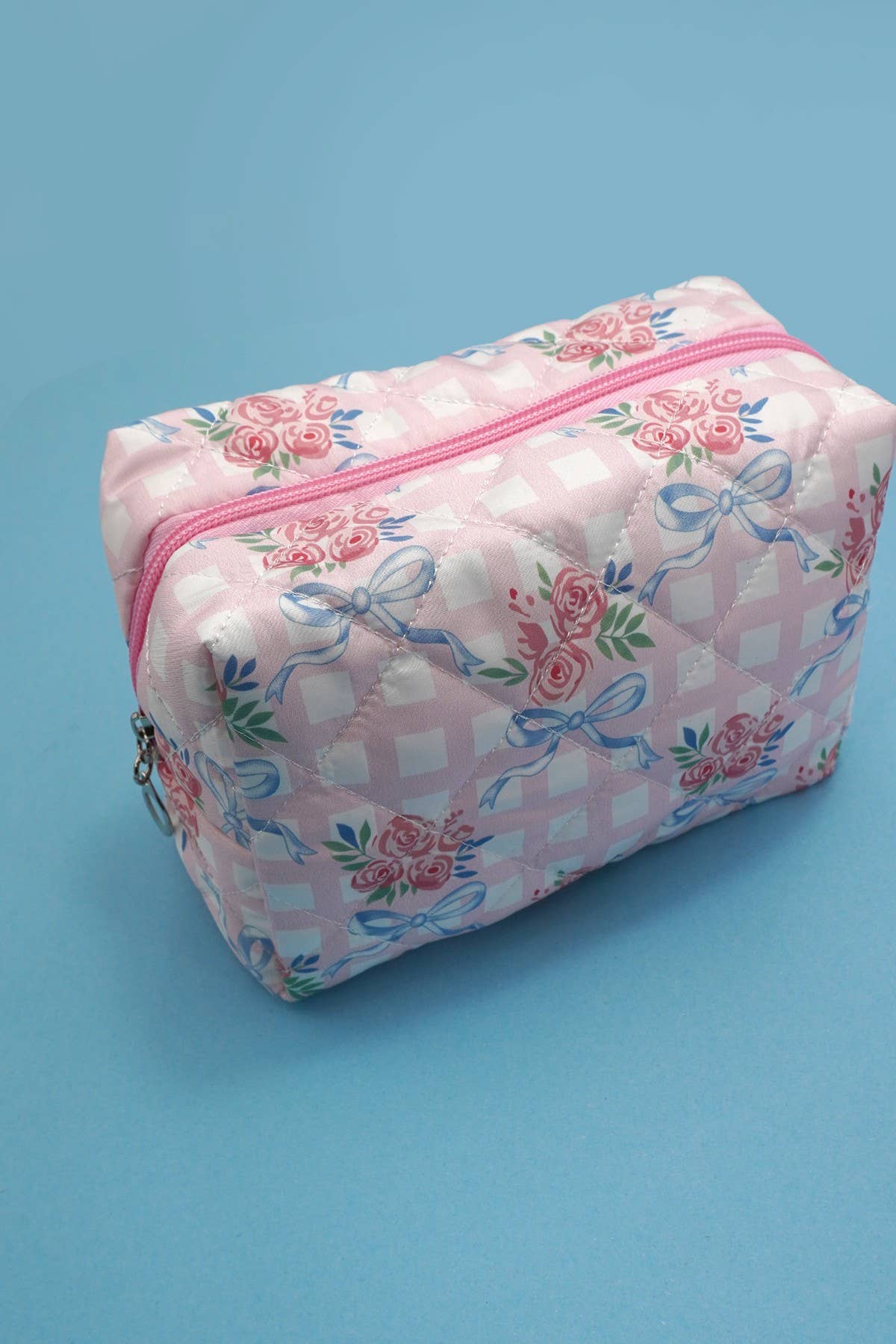 BOW QUILTED COTTON FLORAL COSMETIC BAG
