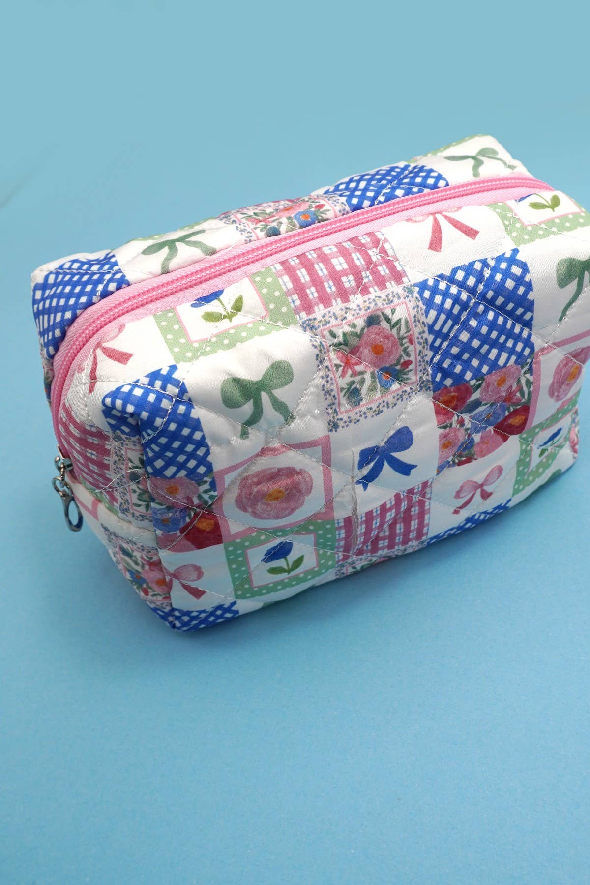 BOW QUILTED COTTON FLORAL COSMETIC BAG