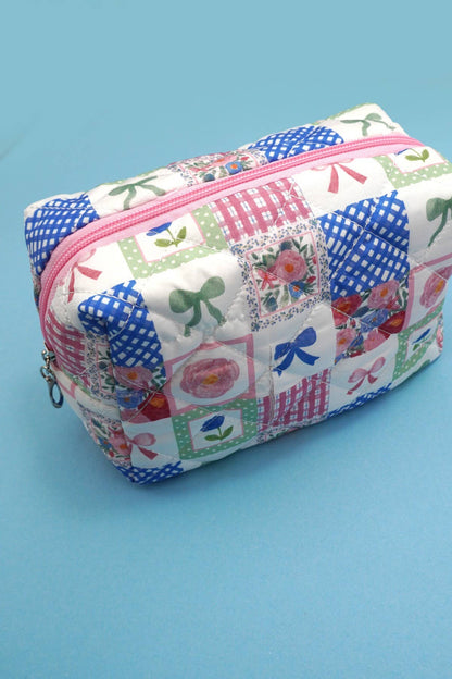 BOW QUILTED COTTON FLORAL COSMETIC BAG