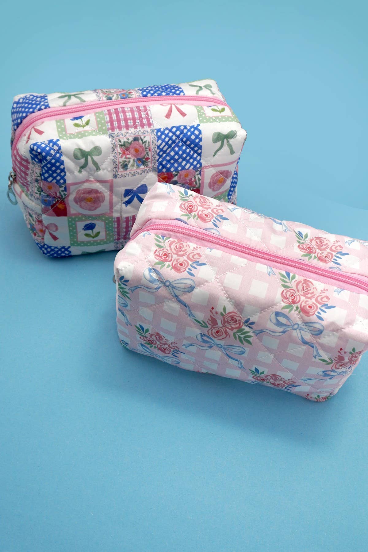 BOW QUILTED COTTON FLORAL COSMETIC BAG