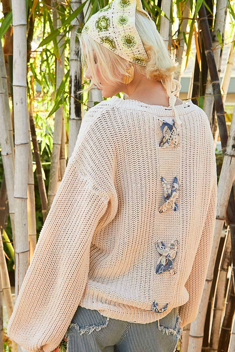 Distressed Pearl/Back Cross Sweater